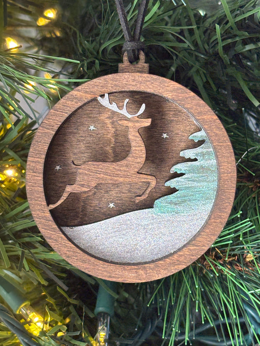 3D Layered Ornament Featuring Leaping Deer in Snow
