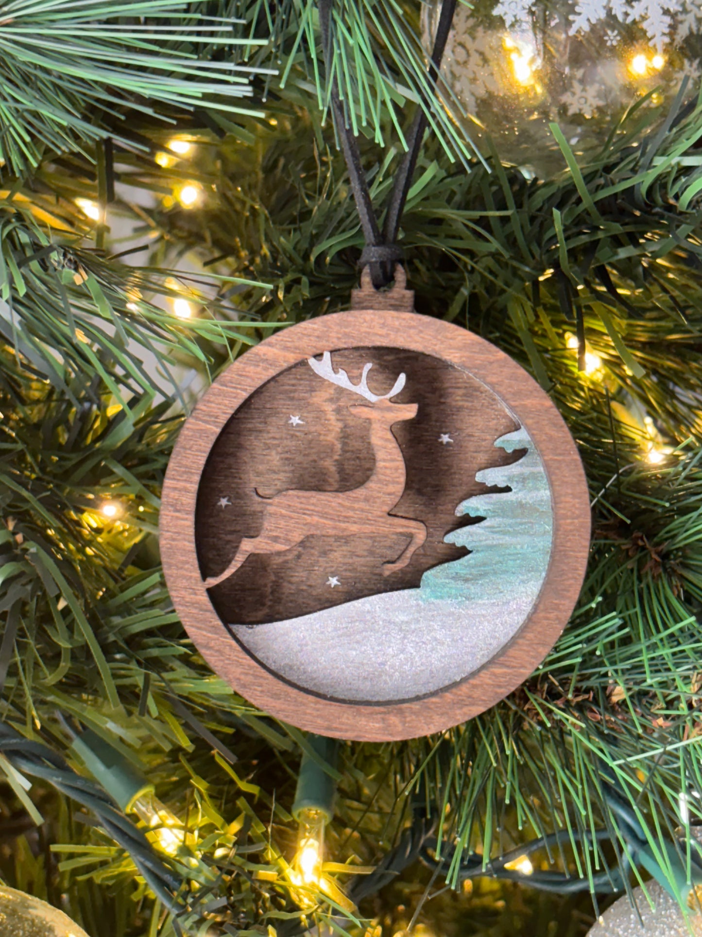 3D Layered Ornament Featuring Leaping Deer in Snow