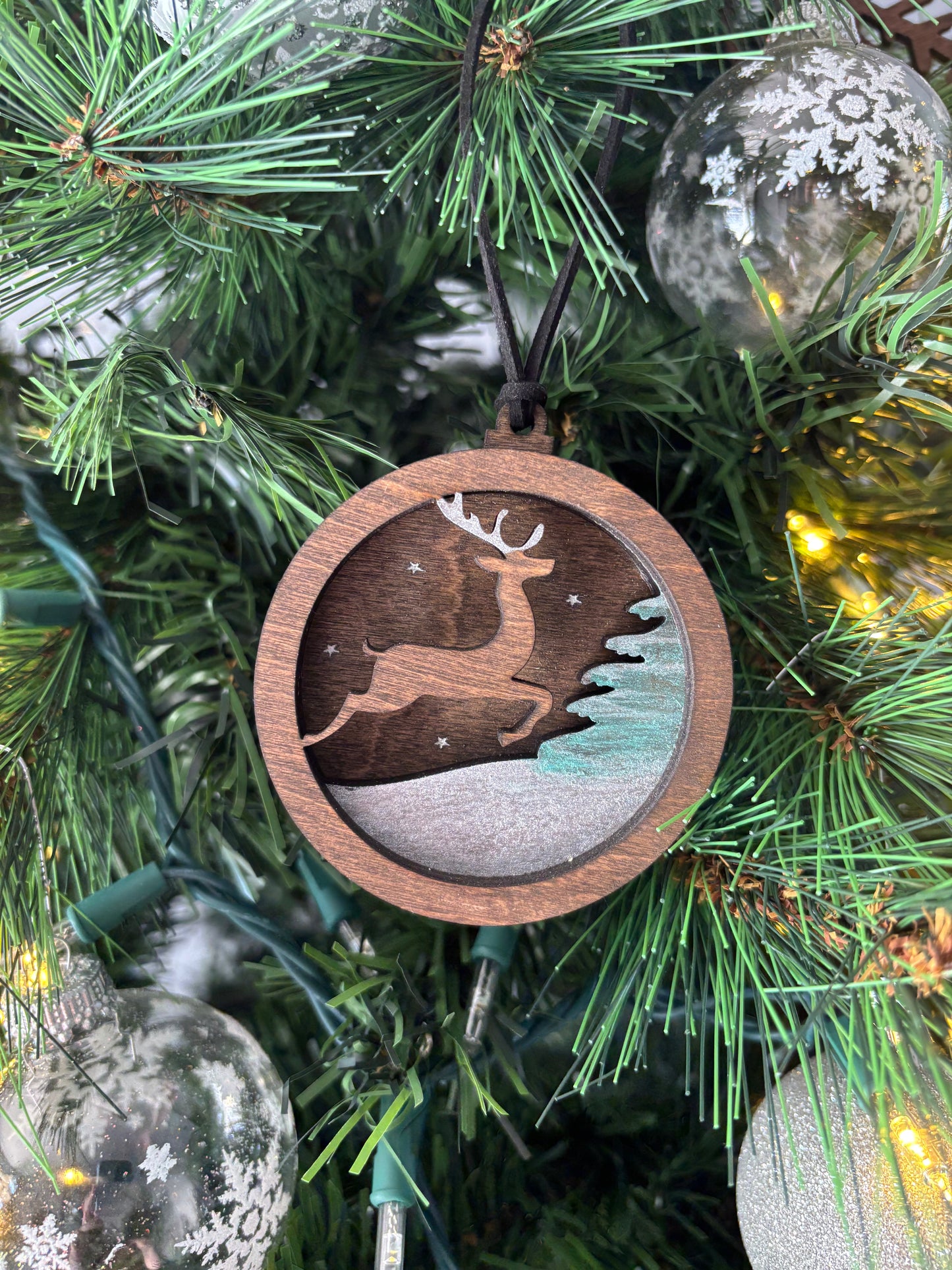 3D Layered Ornament Featuring Leaping Deer in Snow